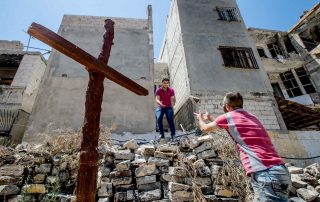 Reconstrução da habitação, escola e igreja ortodoxa grega de St. George, o antigo bairro da cidade de Homs (Síria)