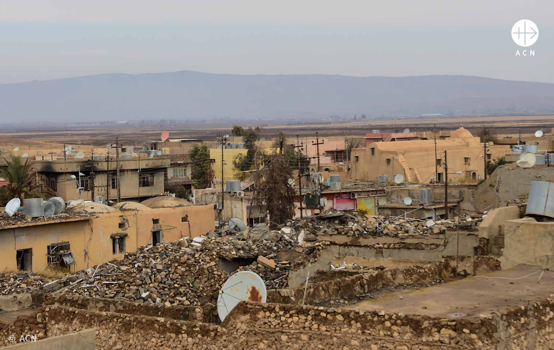 Foto da região do Iraque com casas destruídas
